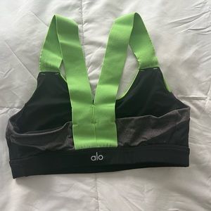 ALO yoga sports bra black with green accents